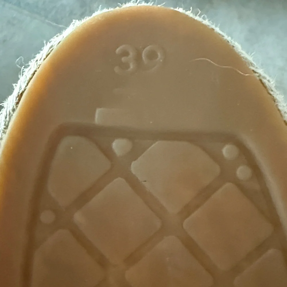CHANEL Two-Tone Leather Espadrilles in Cream and Black
